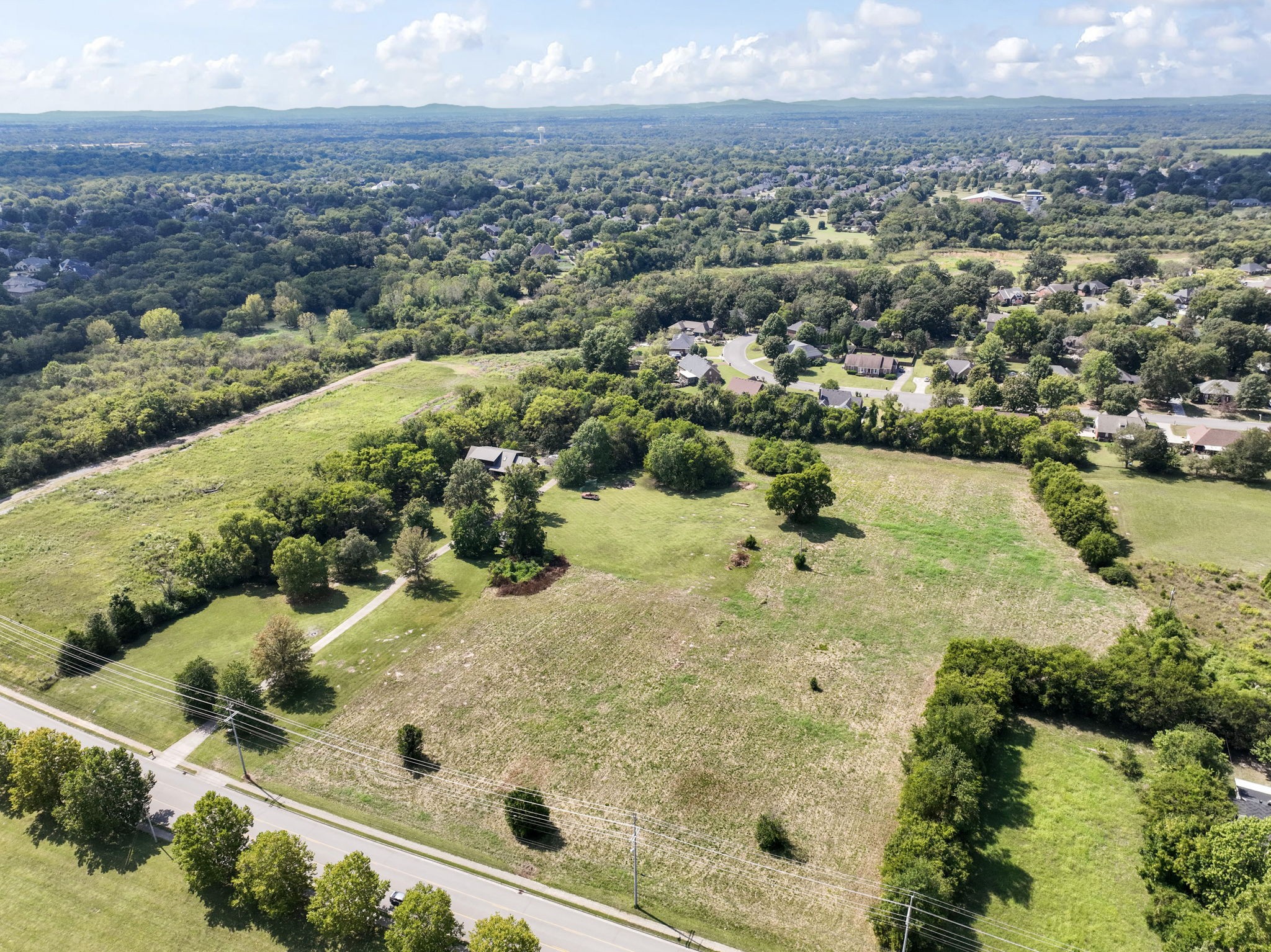 3289 Siegel Road Murfreesboro, TN 37129 - Photo 12 of 14 an aerial view of residential houses with outdoor space