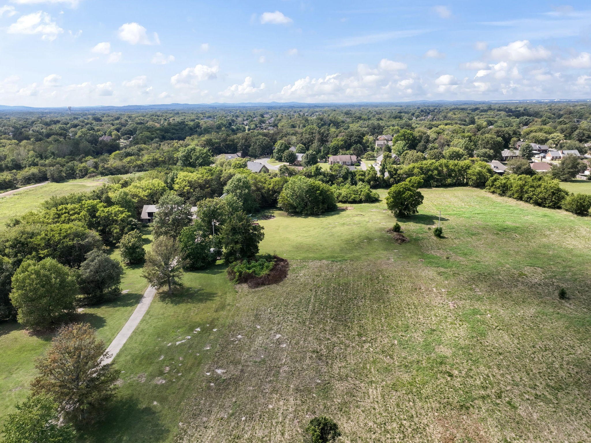 3289 Siegel Road Murfreesboro, TN 37129 - Photo 5 of 14 a view of a forest with a yard