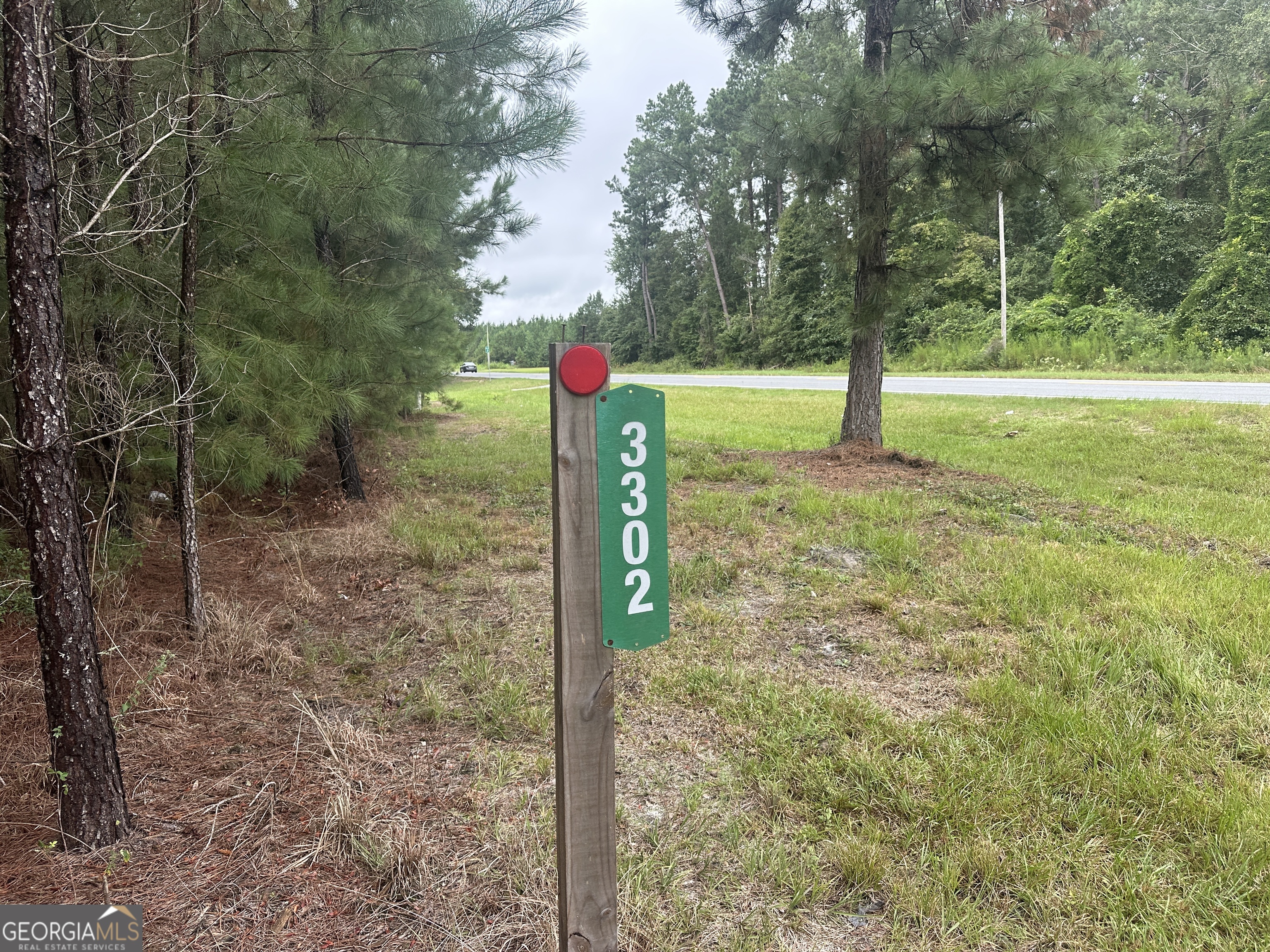 3302 Highway 67 Pembroke, GA 31321 - Photo 20 of 20 a front view of a house with garden