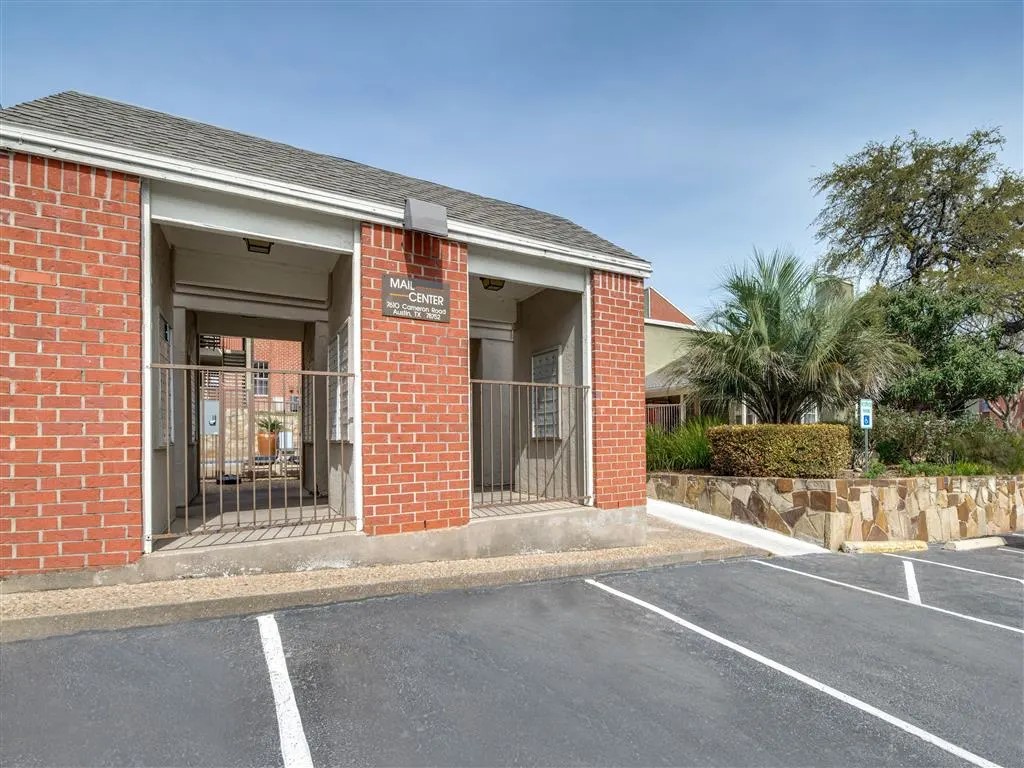 7610 Cameron Road, Unit 2018 Austin, TX 78752 - Photo 24 of 42 front view of a house with a yard