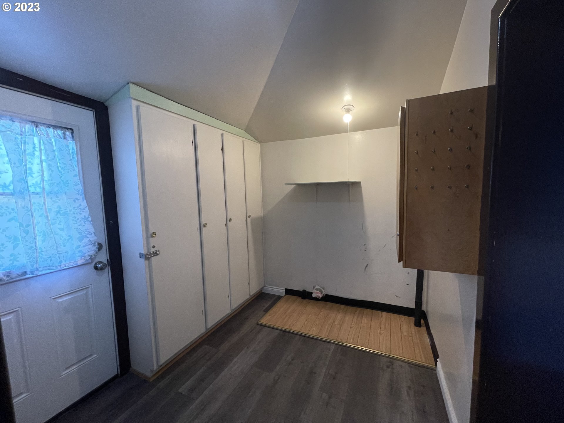 333 Southwest 3rd Street Pendleton, OR 97801 - Photo 11 of 20 an empty room with wooden floor and a window