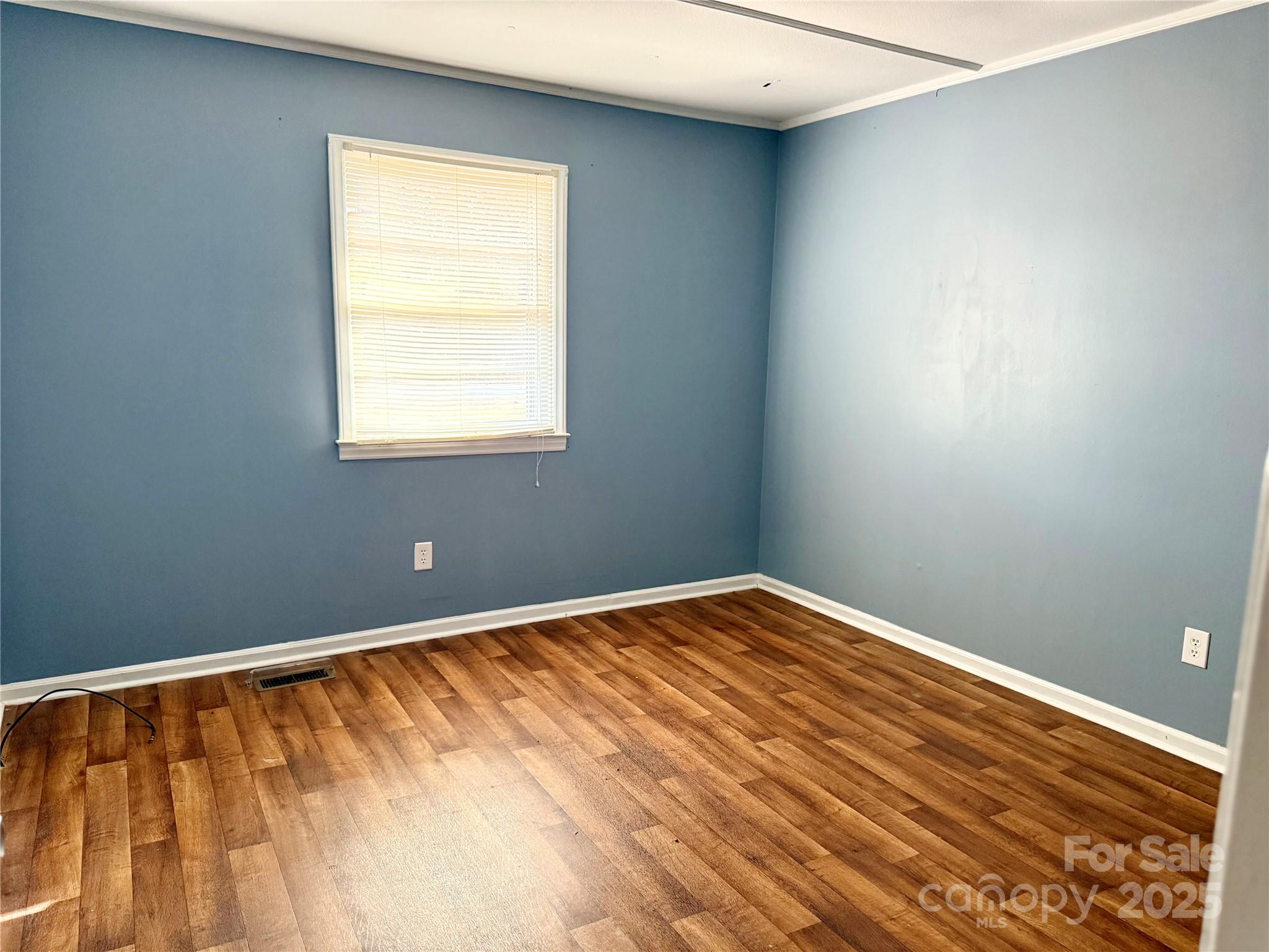 152 Northview-Dorsey Street Rutherfordton, NC 28139 - Photo 3 of 7 a view of an empty room with a window
