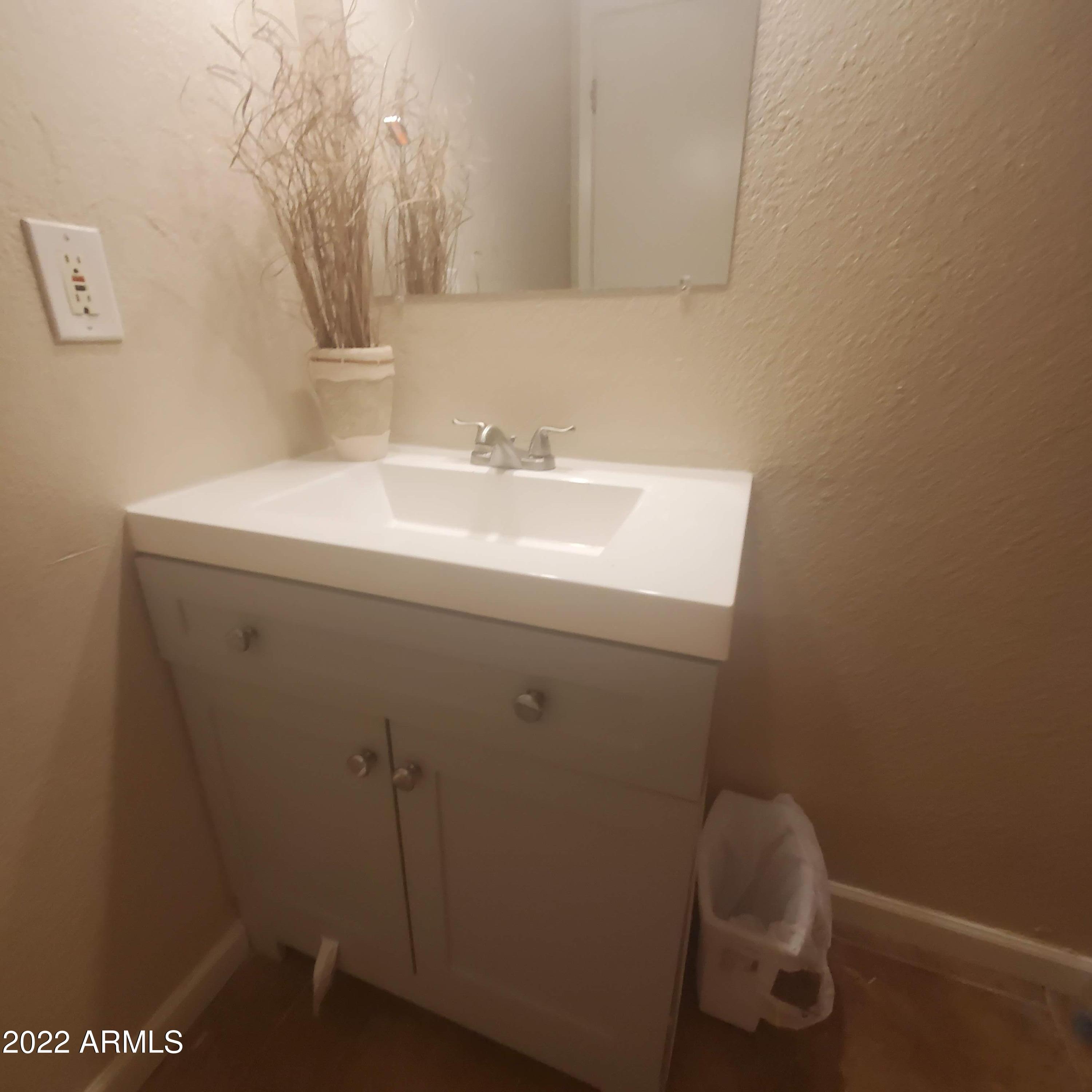 214 East Ruth Avenue, Unit 103 Phoenix, AZ 85020 - Photo 13 of 16 214 E Ruth-Hall Bathroom-Vanity Sink