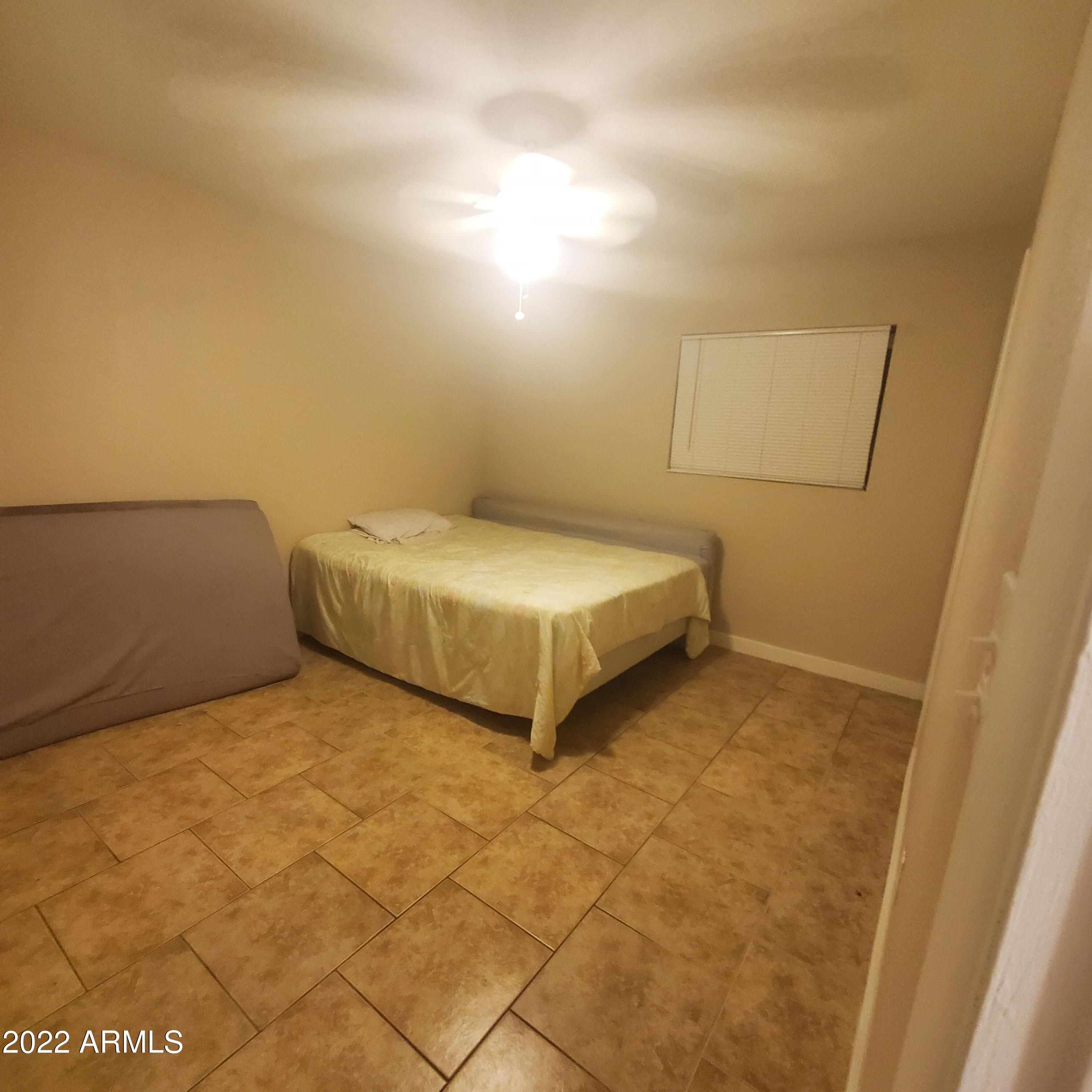214 East Ruth Avenue, Unit 103 Phoenix, AZ 85020 - Photo 7 of 16 214 E Ruth-Master Bedroom