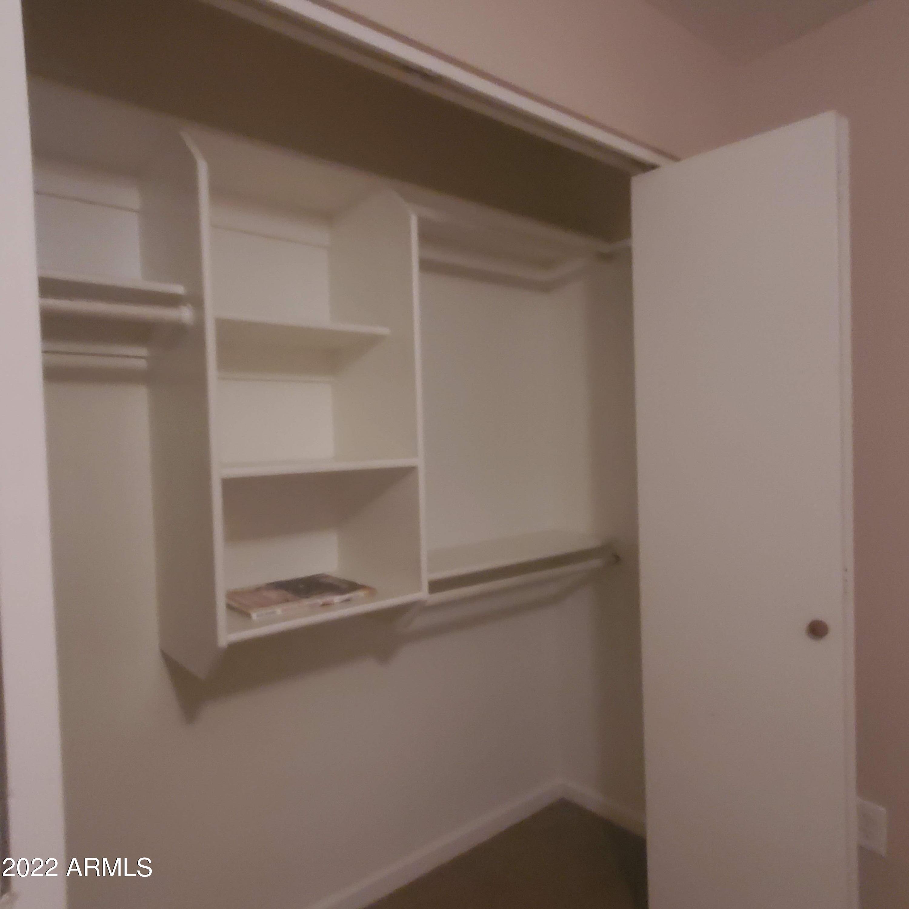 214 East Ruth Avenue, Unit 103 Phoenix, AZ 85020 - Photo 8 of 16 214 E Ruth-Master Closet
