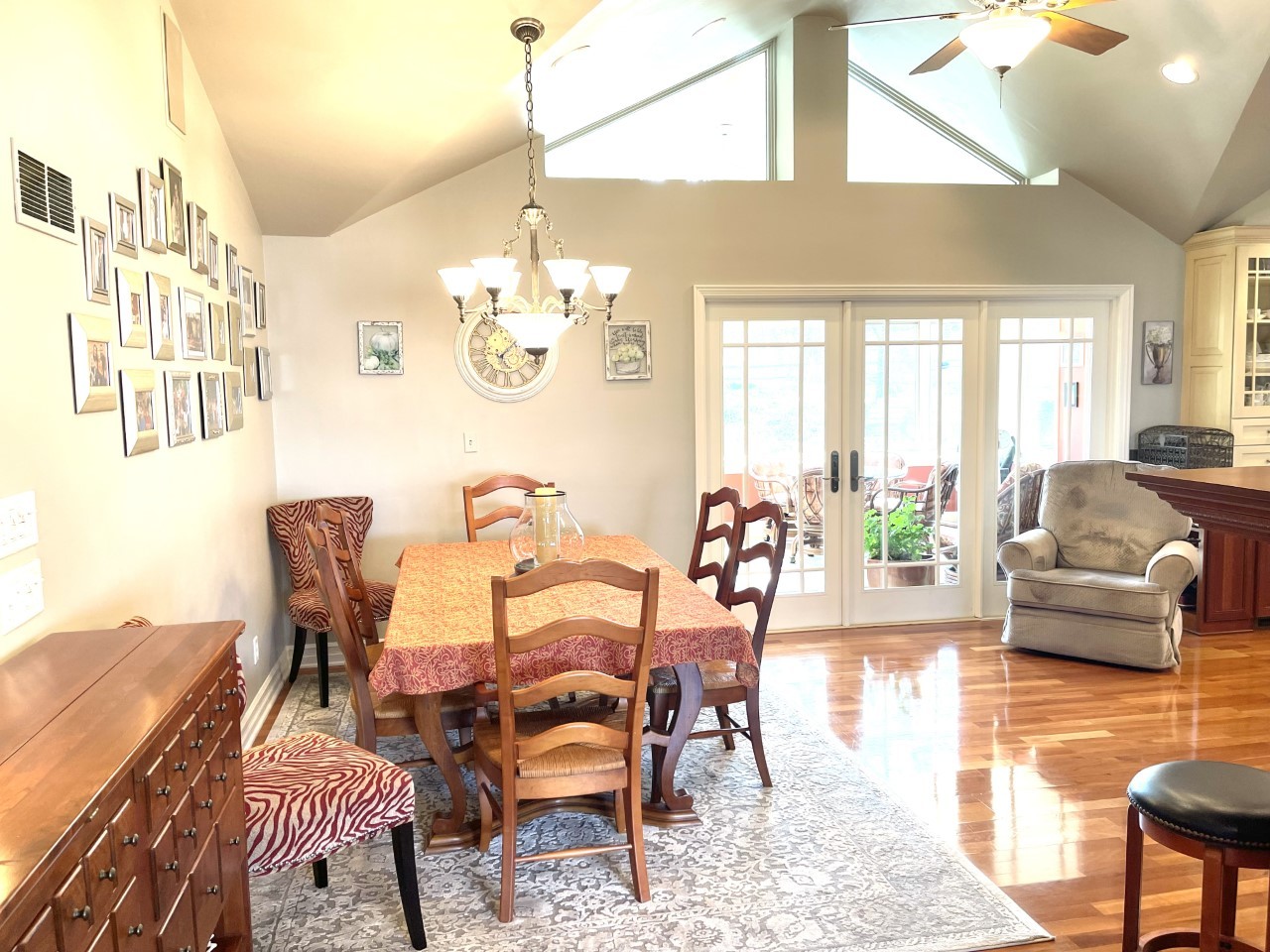 2583 East 259th Road Peru, IL 61354 - Photo 11 of 48 a dining room with furniture a chandelier and wooden floor