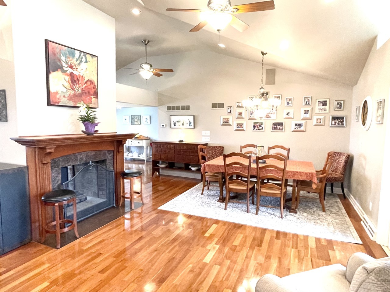 2583 East 259th Road Peru, IL 61354 - Photo 12 of 48 a living room with fireplace furniture and a wooden floor