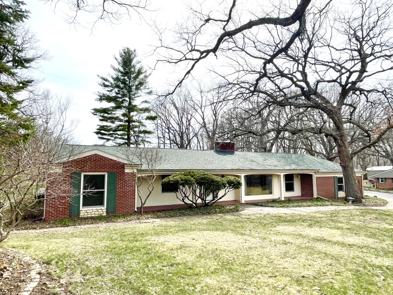 2583 East 259th Road Peru, IL 61354 - Photo 2 of 48 a front view of a house with a yard and garage