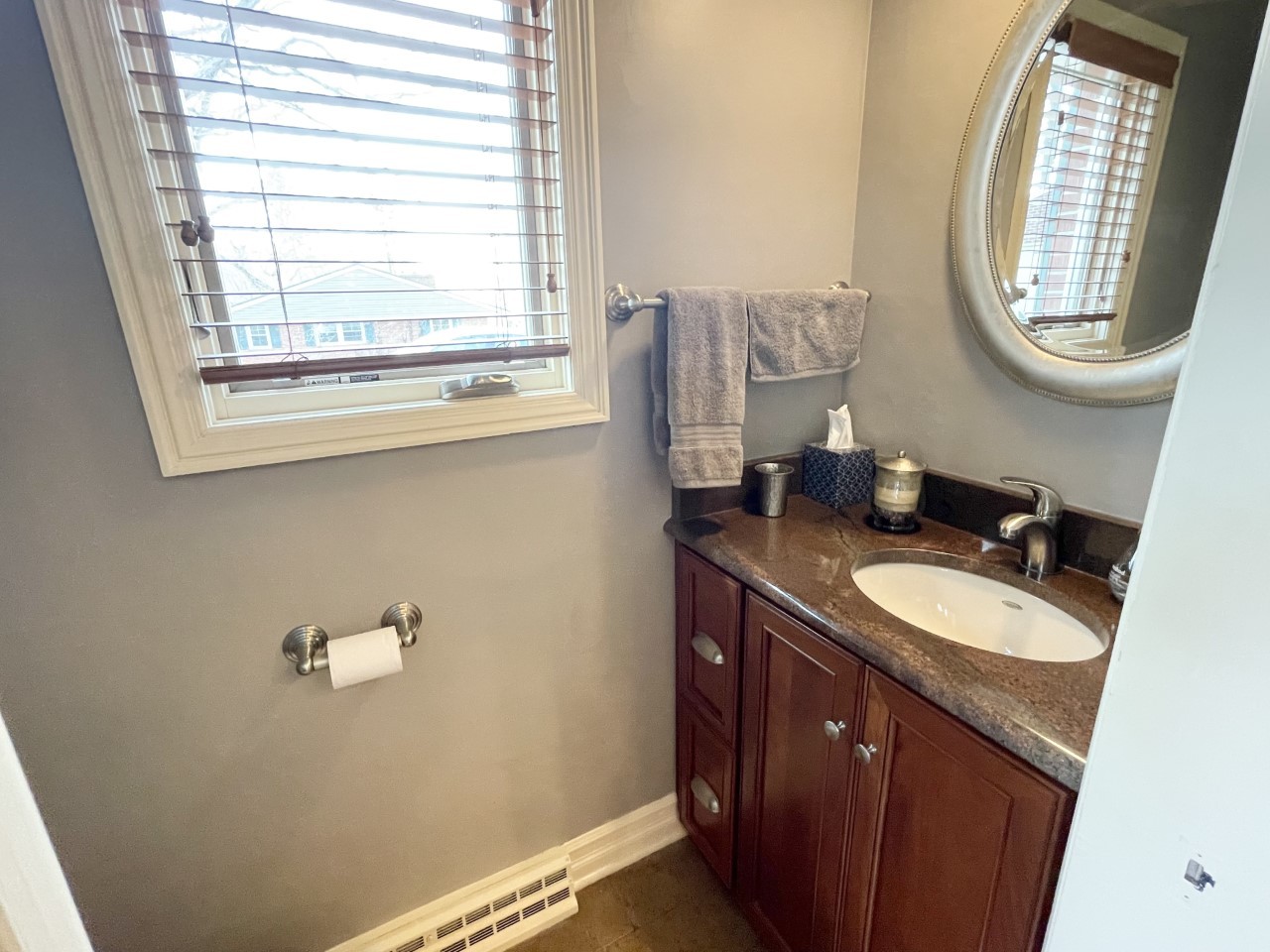 2583 East 259th Road Peru, IL 61354 - Photo 21 of 48 a bathroom with a granite countertop sink and a mirror