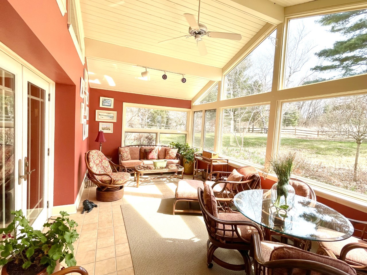 2583 East 259th Road Peru, IL 61354 - Photo 24 of 48 a living room filled with furniture and floor to ceiling windows