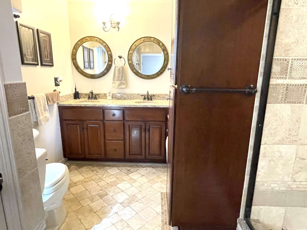 2583 East 259th Road Peru, IL 61354 - Photo 28 of 48 a bathroom with a granite countertop sink and a mirror