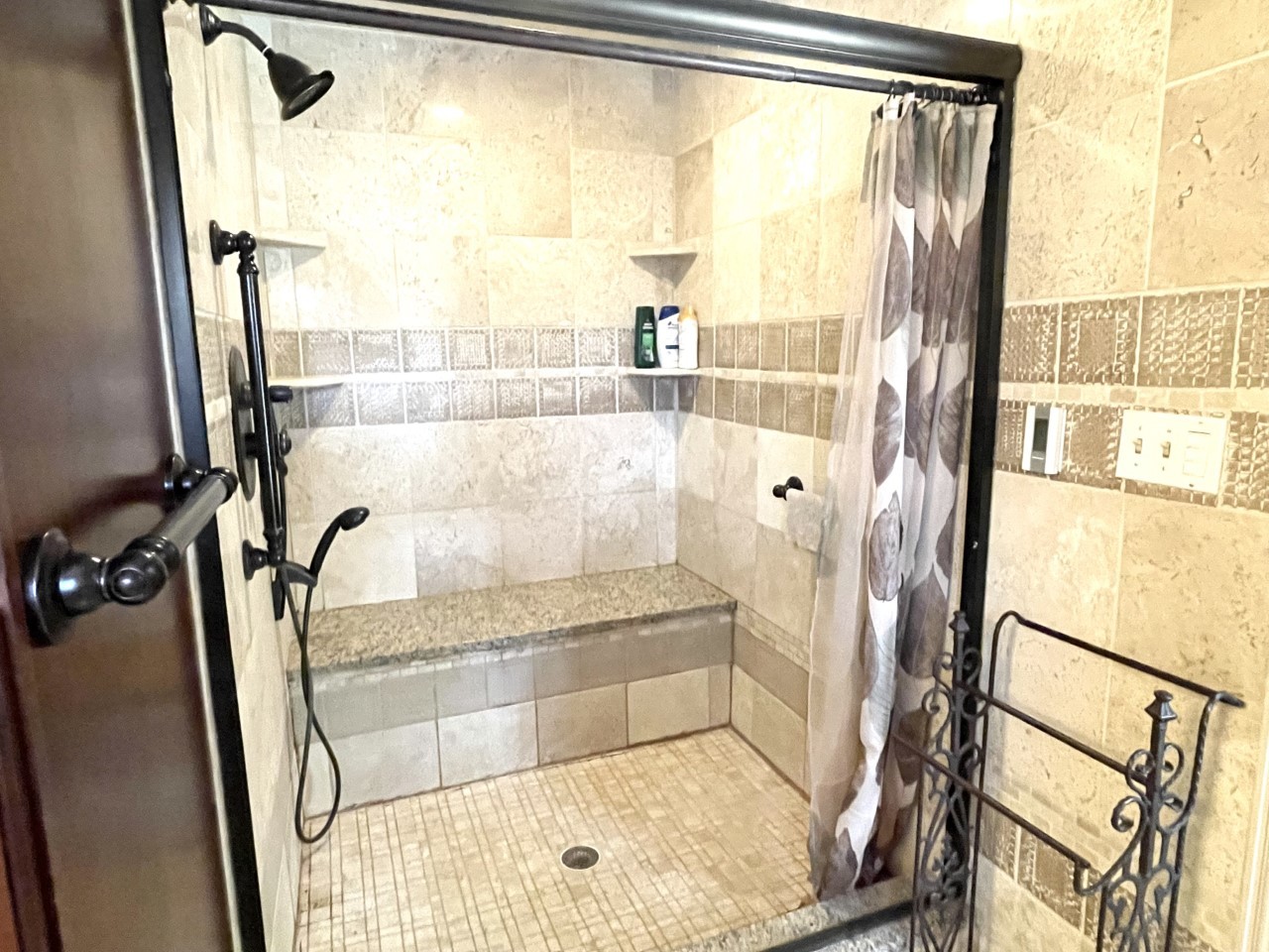2583 East 259th Road Peru, IL 61354 - Photo 30 of 48 a bathroom with a glass shower door