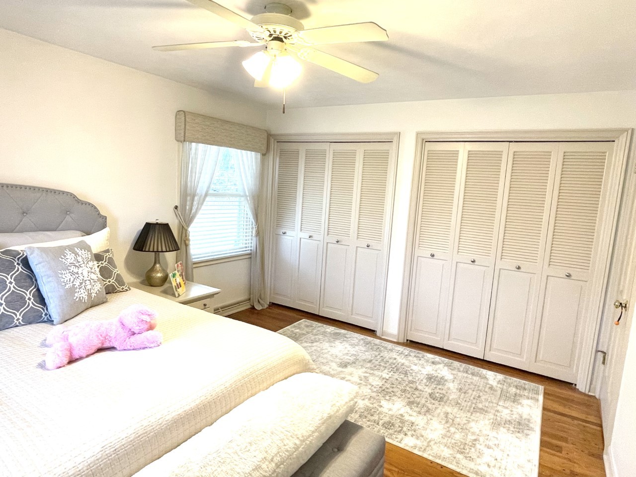 2583 East 259th Road Peru, IL 61354 - Photo 32 of 48 a bedroom with a bed and a chandelier