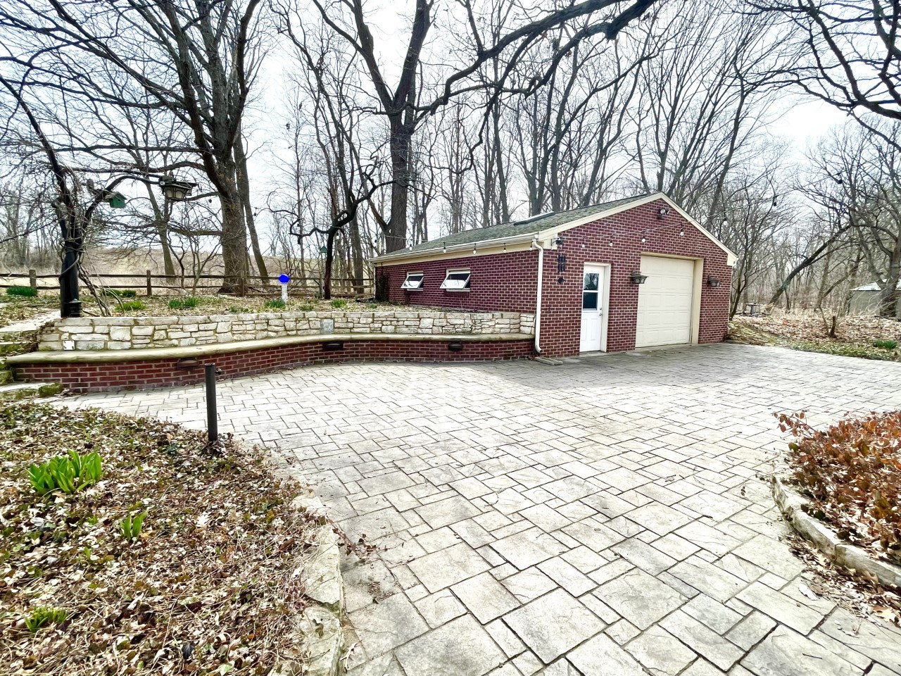 2583 East 259th Road Peru, IL 61354 - Photo 4 of 48 a front view of a house with a yard