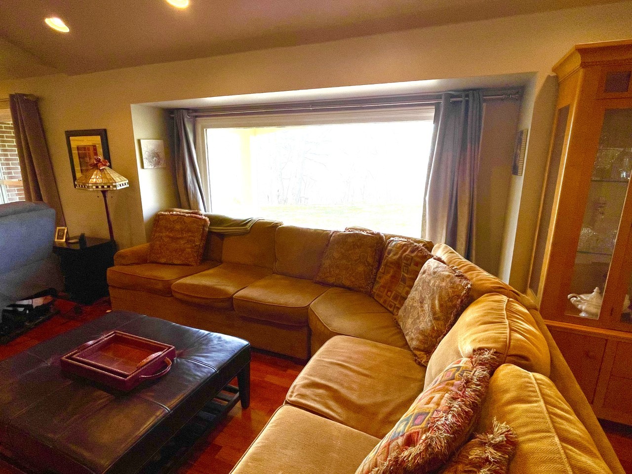2583 East 259th Road Peru, IL 61354 - Photo 6 of 48 a living room with a couch and a window