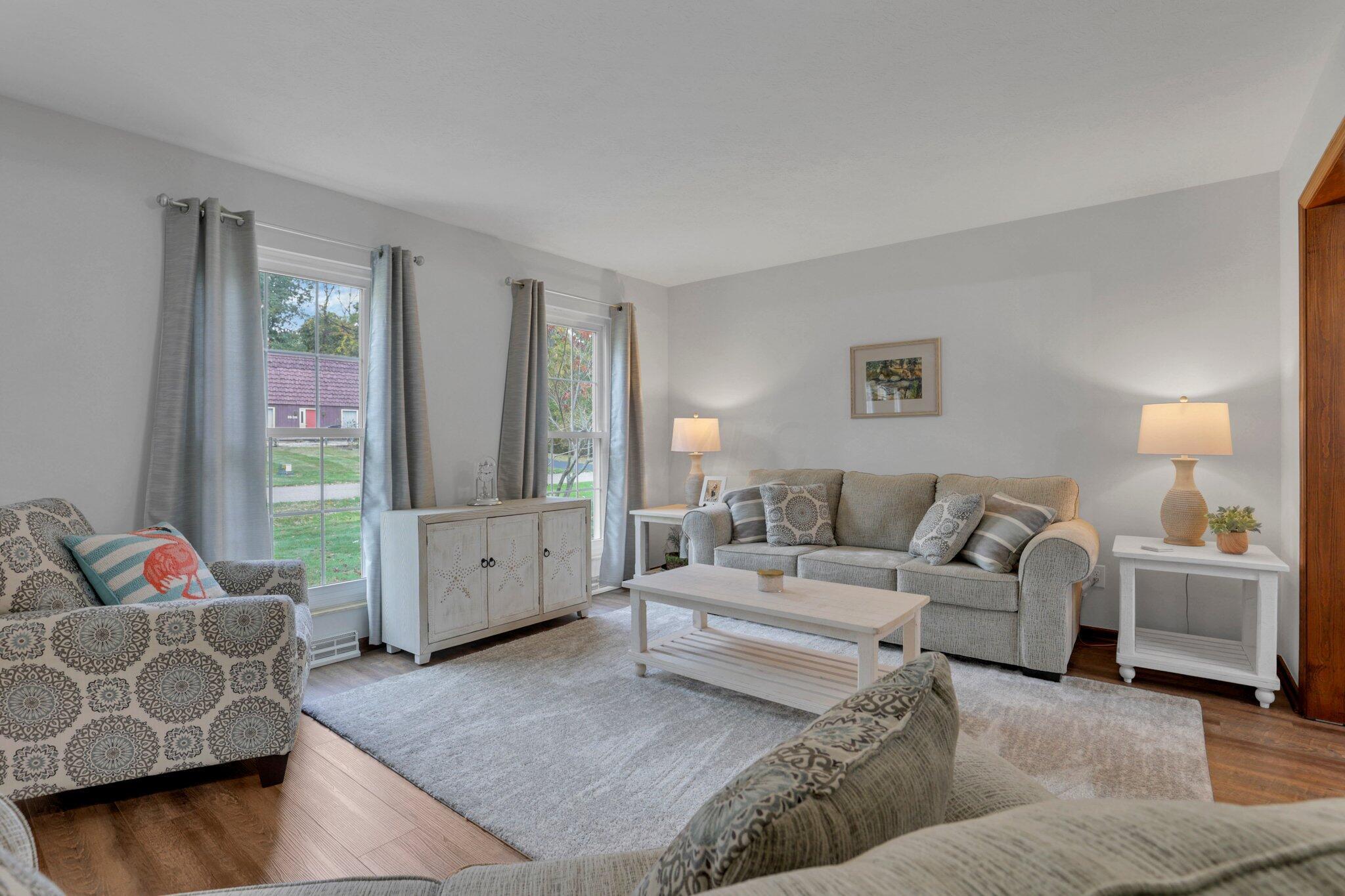 1821 Pine Road Heath, OH 43056 - Photo 2 of 62 Living room - bright and airy! With LVP flooring and fresh paint!