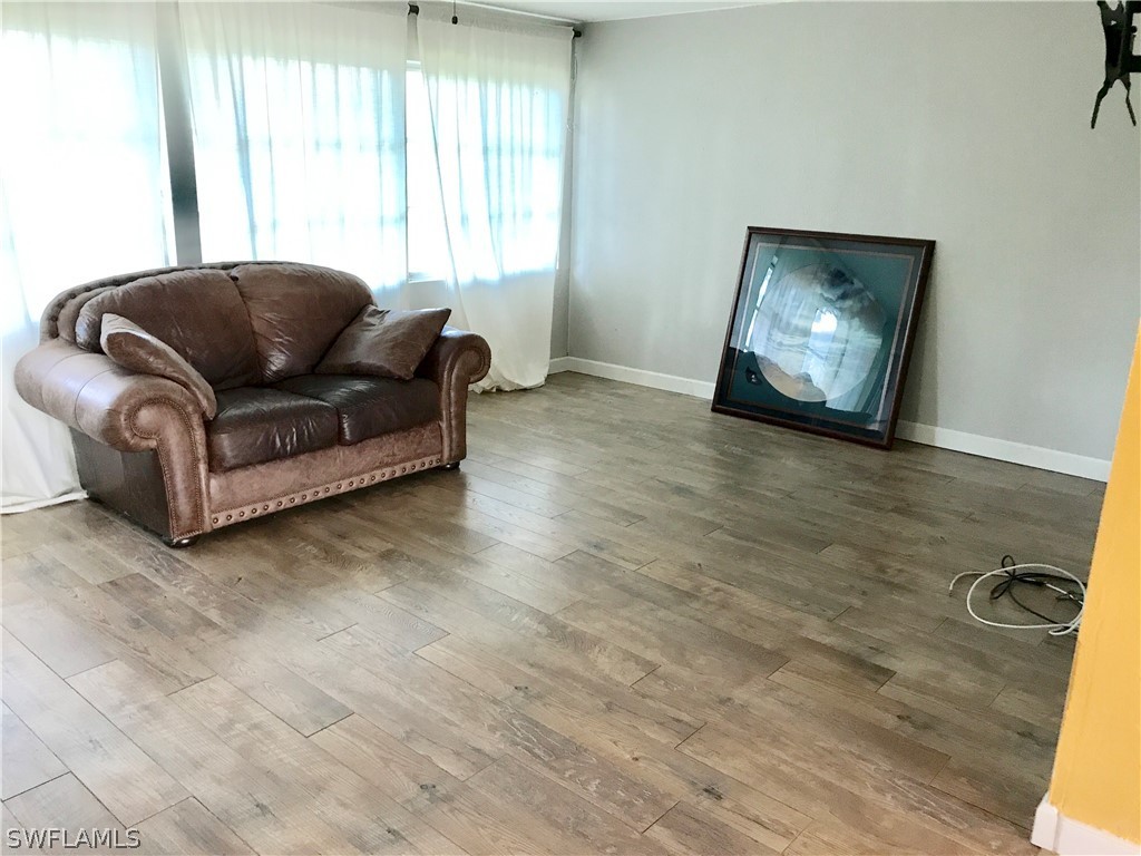 1606 Grove Avenue Fort Myers, FL 33901 - Photo 4 of 7 a living room with furniture and a window