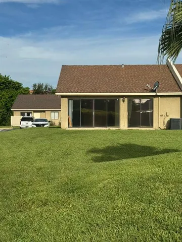 a view of a golf course with a lake