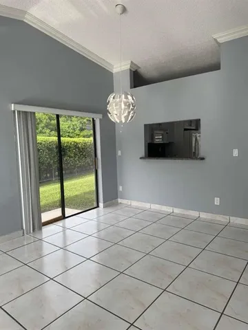 a view of a livingroom with a large window