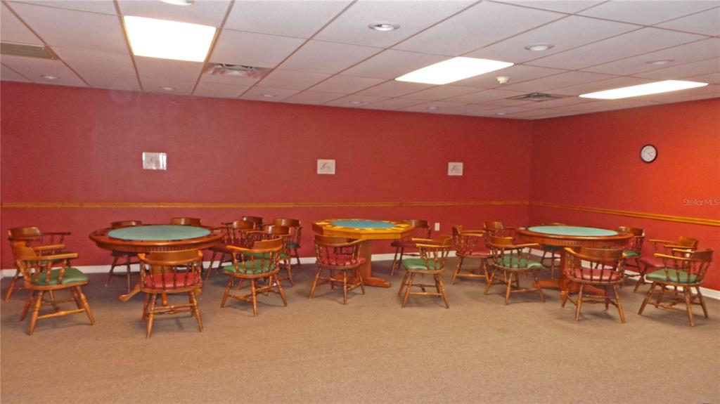 11204 Pembridge Court, Unit 4 Port Richey, FL 34668 - Photo 40 of 58 a view of a big room with chairs