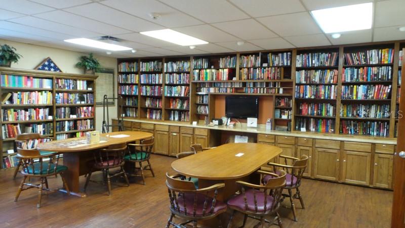 11204 Pembridge Court, Unit 4 Port Richey, FL 34668 - Photo 42 of 58 a view of a workspace with furniture and bathroom