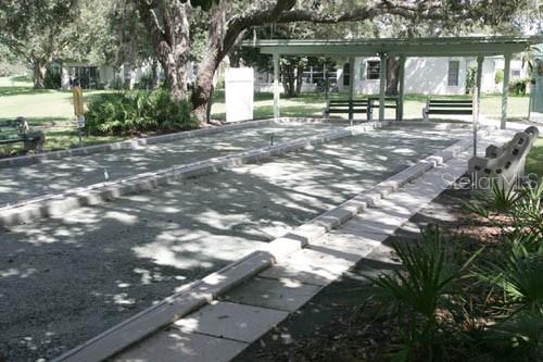 11204 Pembridge Court, Unit 4 Port Richey, FL 34668 - Photo 46 of 58 a view of outdoor space with deck and patio