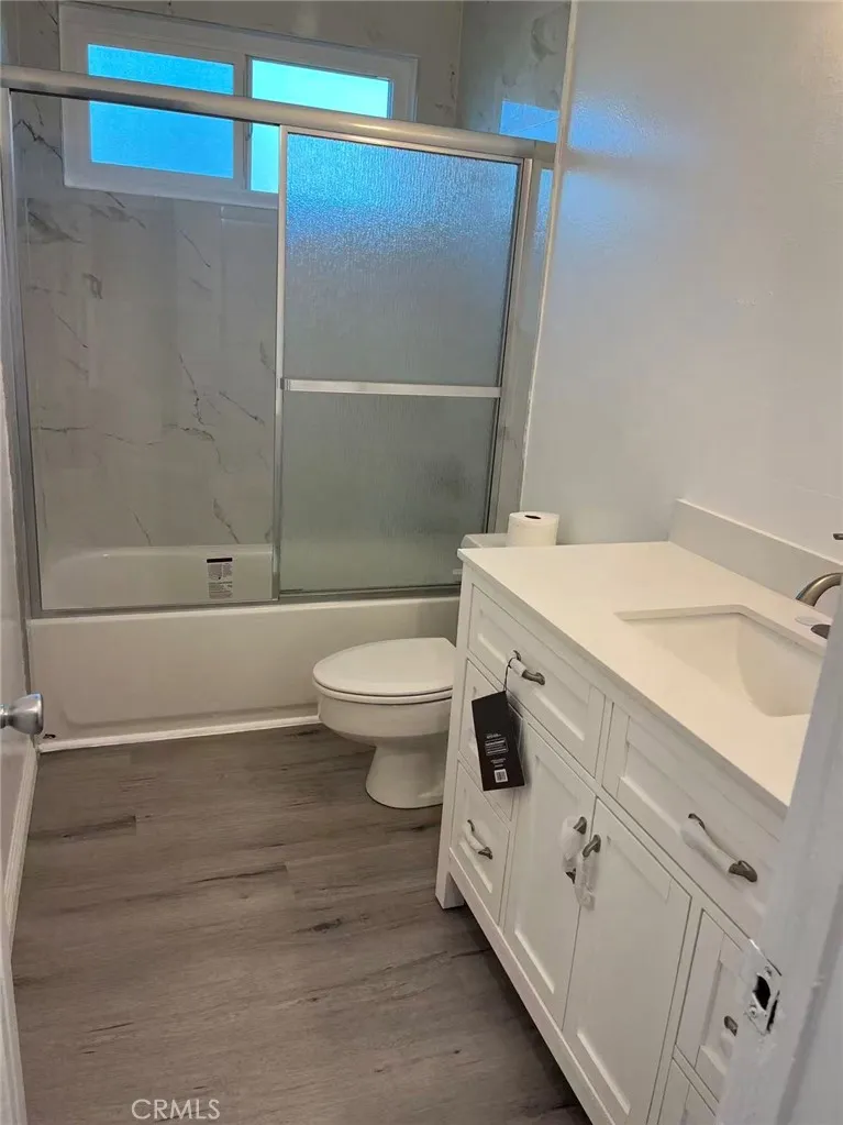 620 East 6th Street Azusa, CA 91702 - Photo 16 of 37 a bathroom with a sink a toilet and shower