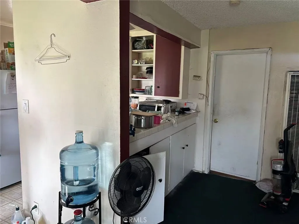 620 East 6th Street Azusa, CA 91702 - Photo 29 of 37 a bathroom with a sink and a mirror
