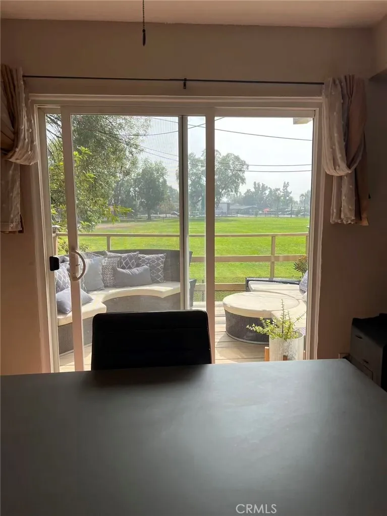 620 East 6th Street Azusa, CA 91702 - Photo 30 of 37 a living room with a large window and yard
