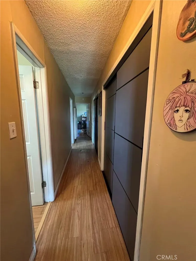 620 East 6th Street Azusa, CA 91702 - Photo 33 of 37 a view of a hallway with wooden floor