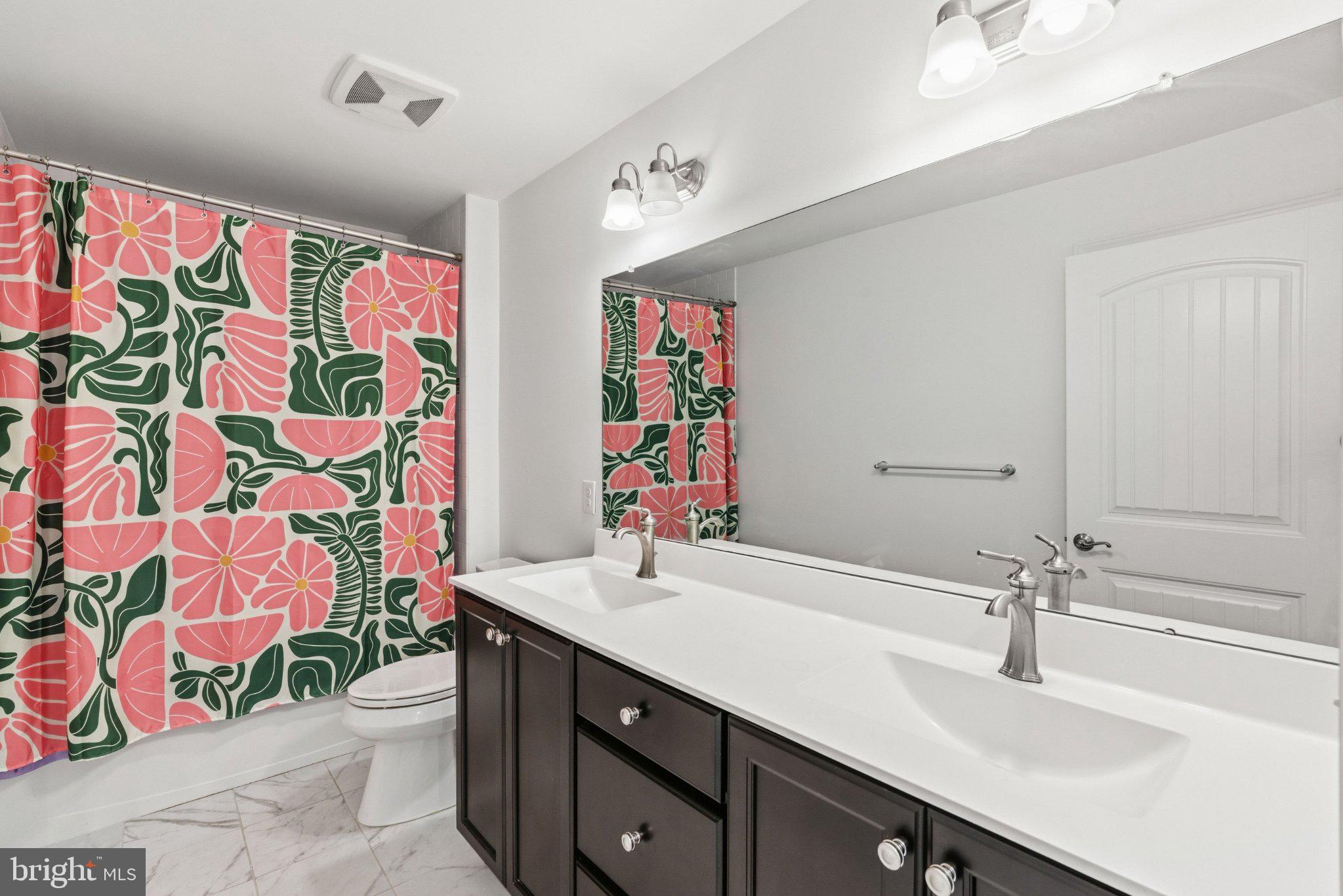 41 Spring Mill Drive Warminster, PA 18974 - Photo 26 of 45 Vibrant floral bathroom retreat.