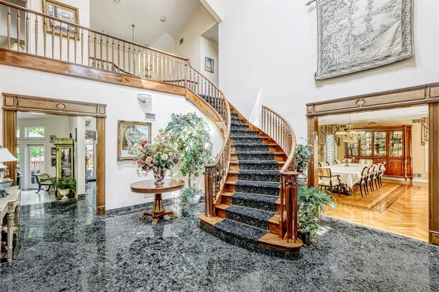 a view of entryway livingroom and hall