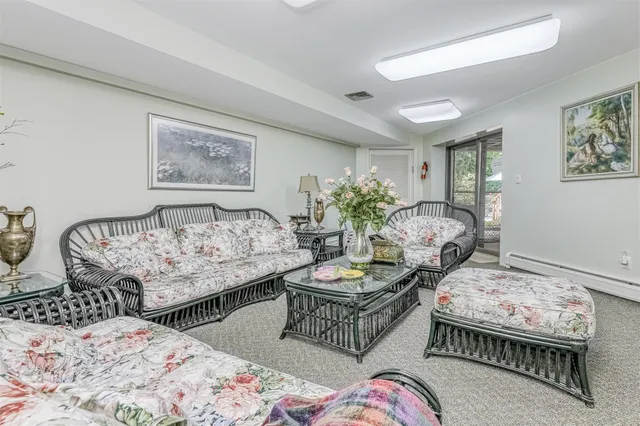 a bedroom with furniture and a bed