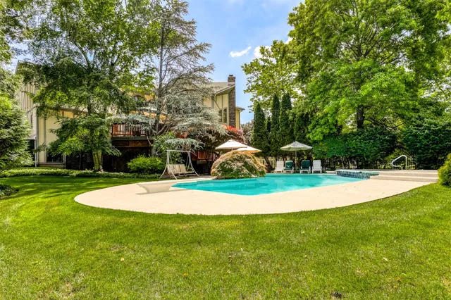 a view of a playground with basketball court