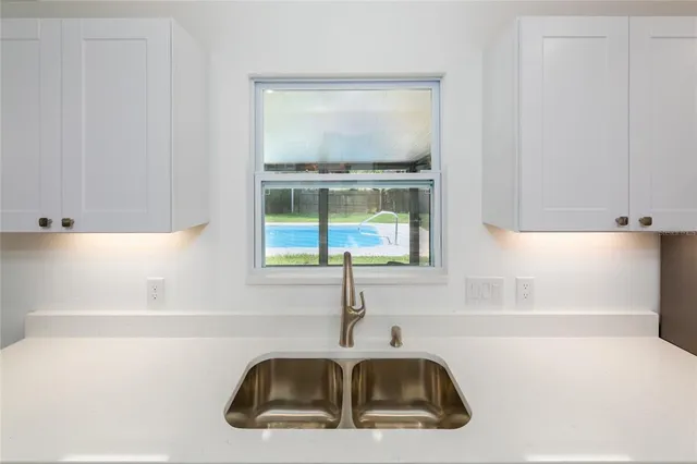 a bathroom with a sink and a bathtub