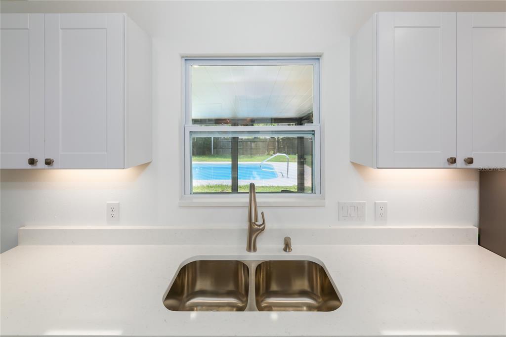 4975 Fay Boulevard Cocoa, FL 32927 - Photo 11 of 35 a bathroom with a sink and a bathtub