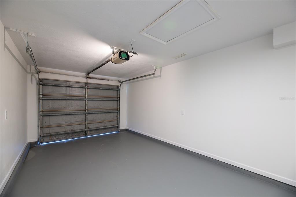 4975 Fay Boulevard Cocoa, FL 32927 - Photo 21 of 35 a view of room and racks on the wall