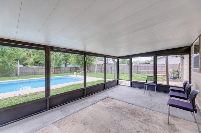 a view of a furniture and floor to ceiling window