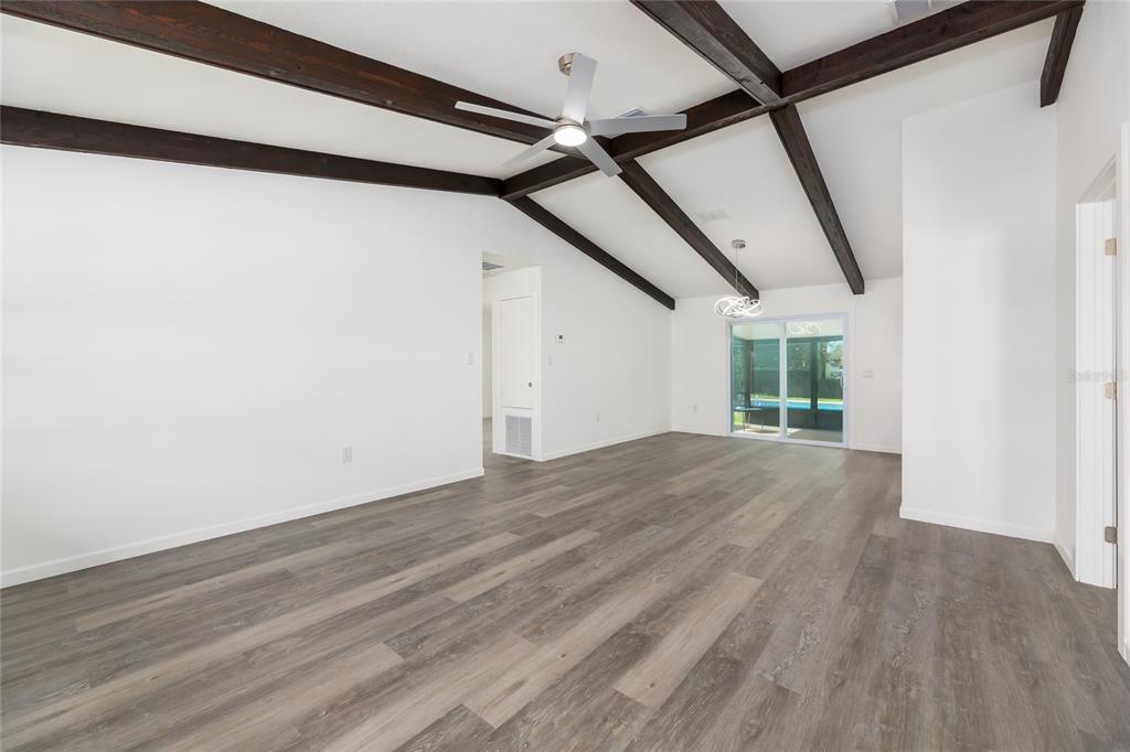4975 Fay Boulevard Cocoa, FL 32927 - Photo 5 of 35 a view of hallway with wooden floor