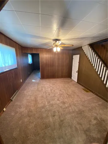 a kitchen with a wooden floor and a stove
