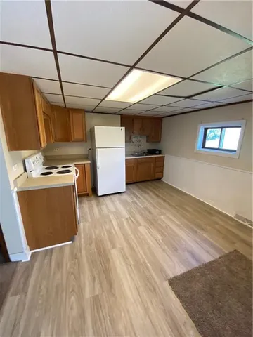 a kitchen with a stove and a microwave