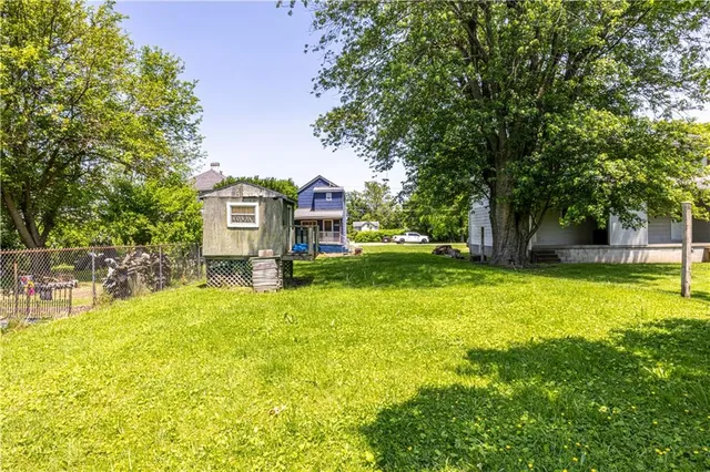 a view of a house with a swimming pool