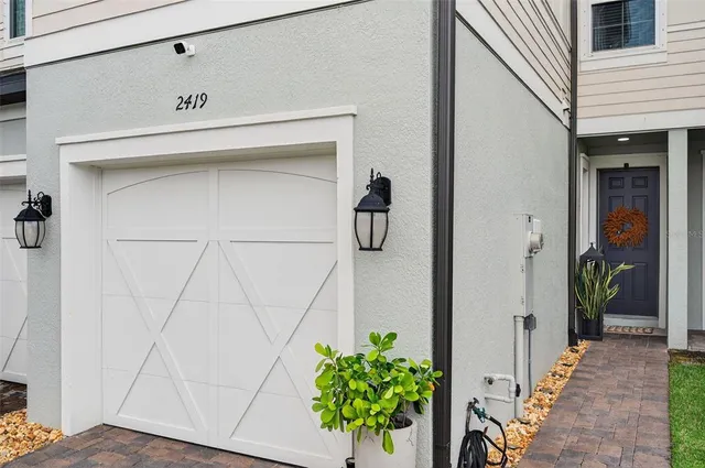 a dining room with furniture a rug and a window