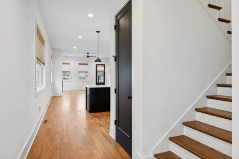 a view of a living room with windows