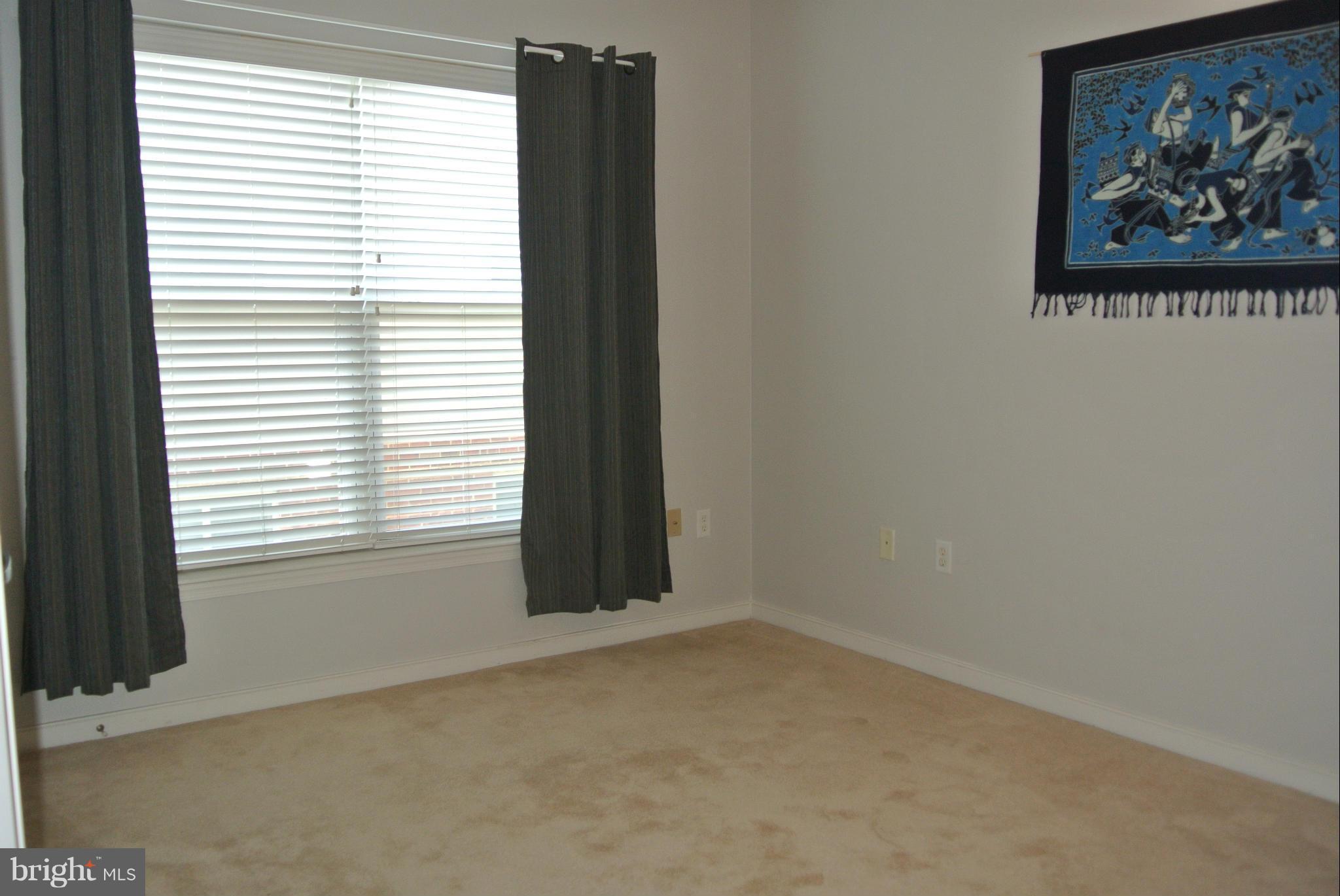 8045 Newell Street, Unit 218 Silver Spring, MD 20910 - Photo 21 of 30 Bedroom