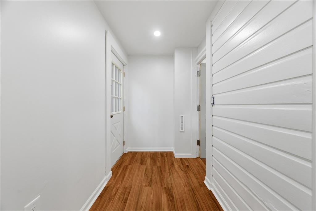 620 Montclair Street Pittsburgh, PA 15217 - Photo 18 of 40 a view of a hallway with wooden floor and staircase