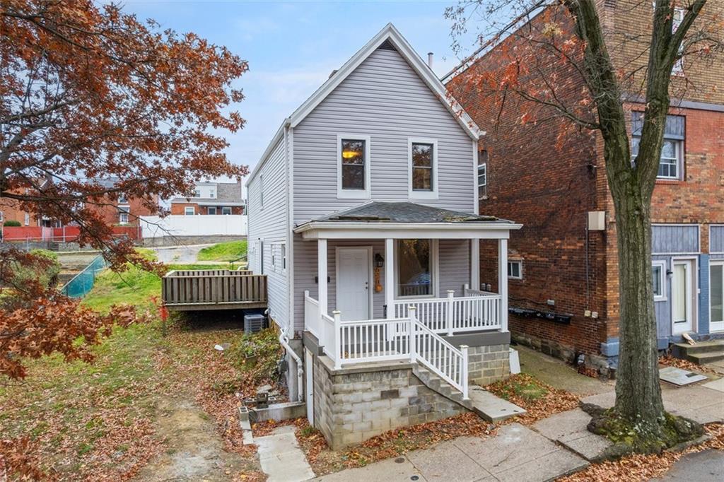 620 Montclair Street Pittsburgh, PA 15217 - Photo 2 of 40 a view of a house with a yard and balcony