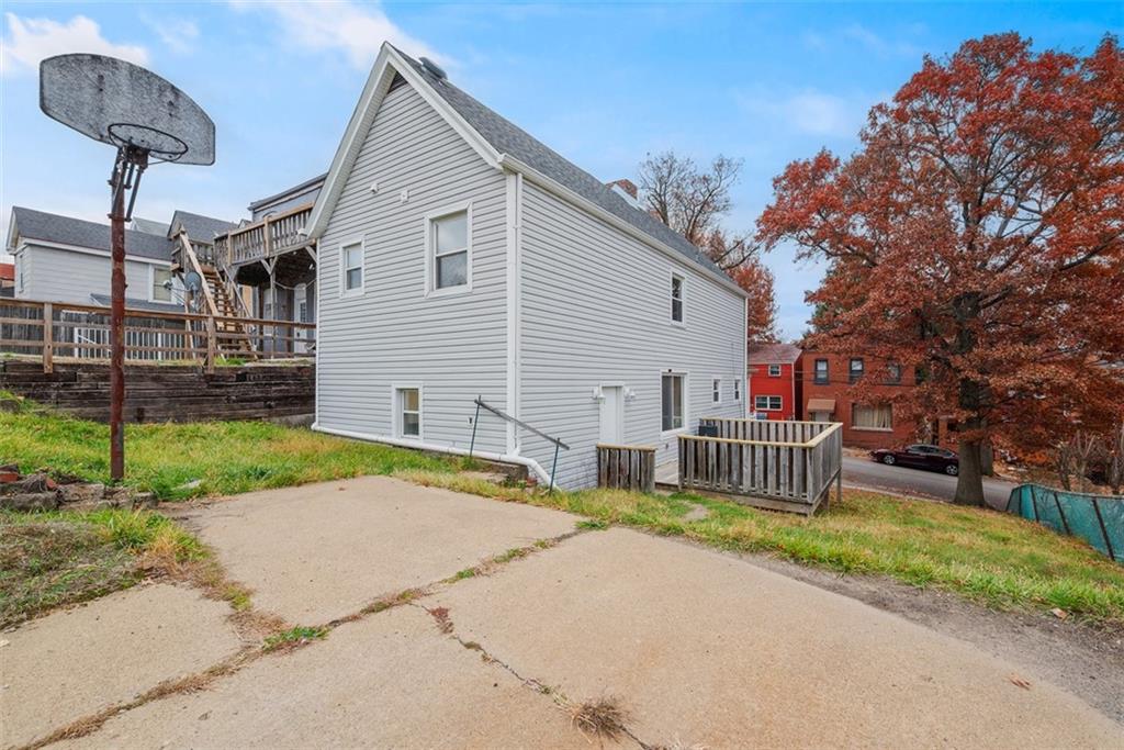 620 Montclair Street Pittsburgh, PA 15217 - Photo 33 of 40 a front view of a house with a yard and fence