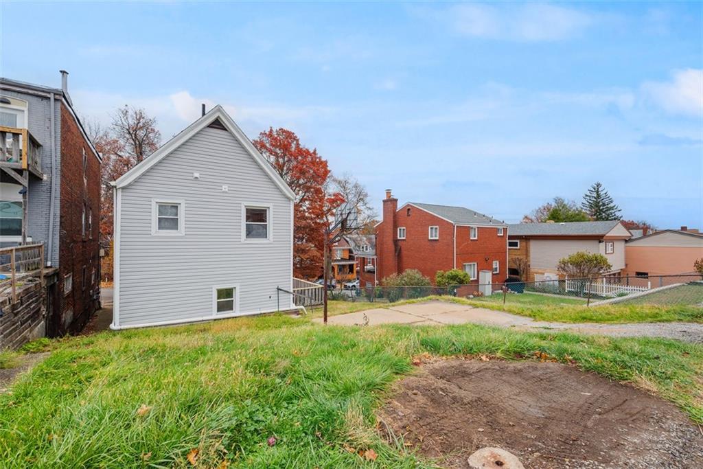 620 Montclair Street Pittsburgh, PA 15217 - Photo 35 of 40 a view of a house with a yard and table and chairs