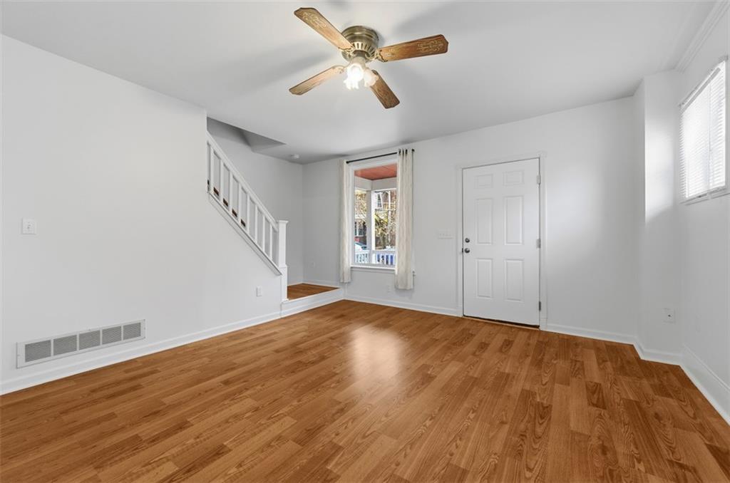 620 Montclair Street Pittsburgh, PA 15217 - Photo 7 of 40 wooden floor in an empty room with a window